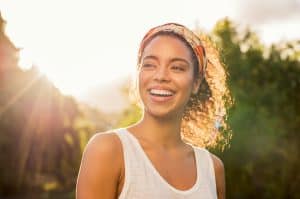 Portrait,Of,Beautiful,African,American,Woman,Smiling,And,Looking,Away